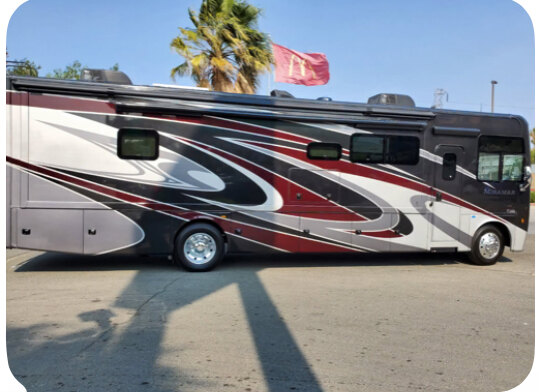 Premium motor coach detailing — polished Class A coach, full side