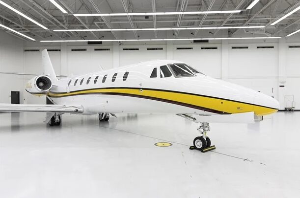 Private jet detailed to a mirror finish in the hangar